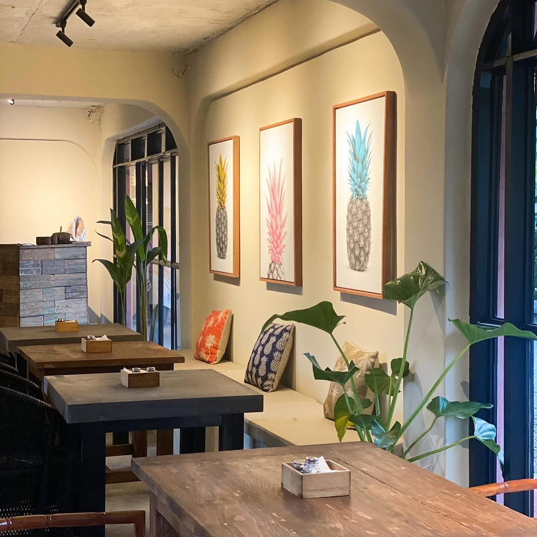 PIÑA interior with pineapple motif cushions